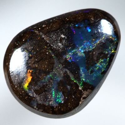 SOLID BOULDER OPAL Rolling flashes of bright fire over patterned boulder opal